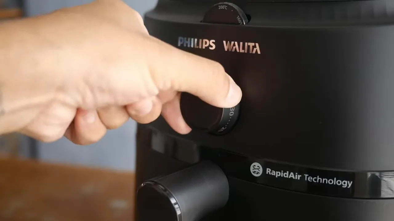 Acionamento do botão do timer analógico da airfryer Philips Walita