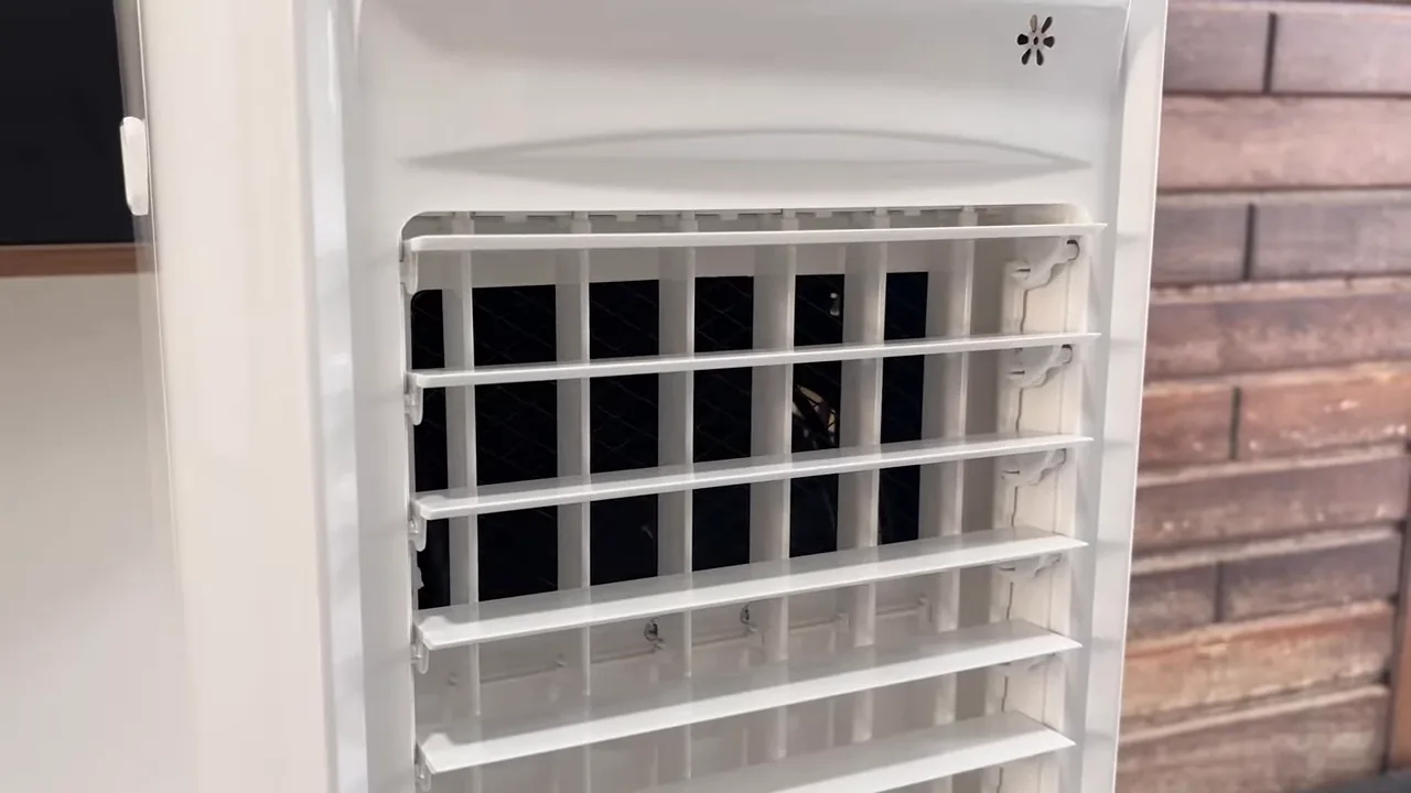 Aletas internas do climatizador oscilando para distribuir o fluxo de ar