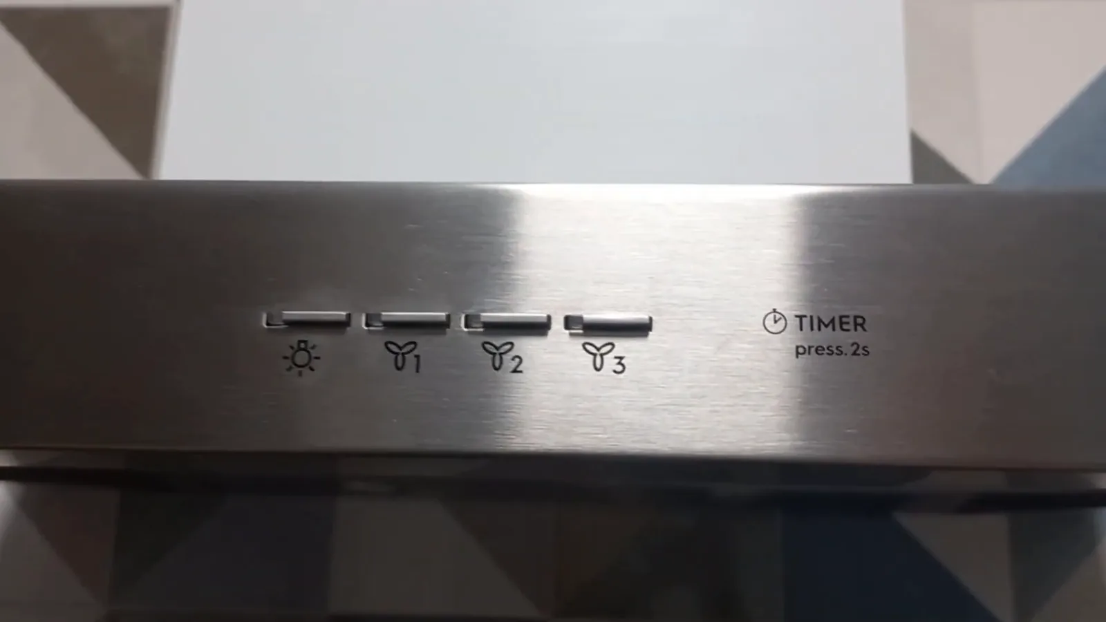 Painel de botões da coifa com controle de velocidade e timer