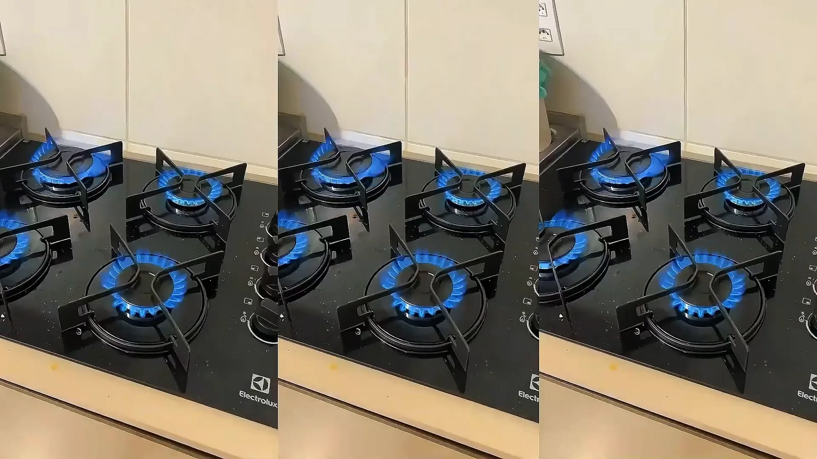 Quatro queimadores acesos simultaneamente no cooktop de vidro Electrolux
