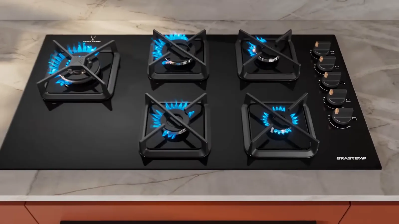 Cooktop Brastemp com todas as cinco bocas a gás acesas