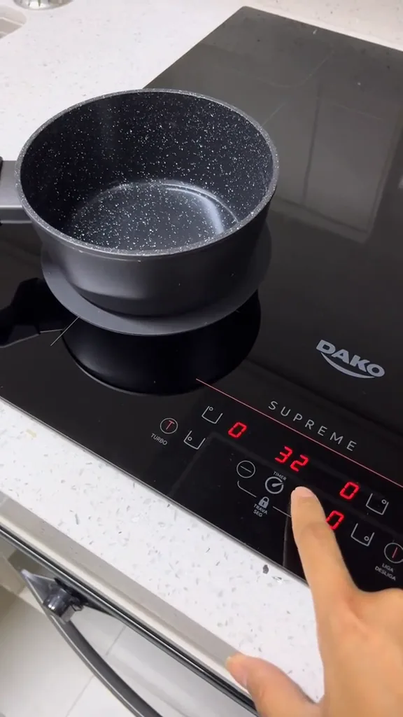 Display digital do cooktop de indução exibindo o timer programado em minutos