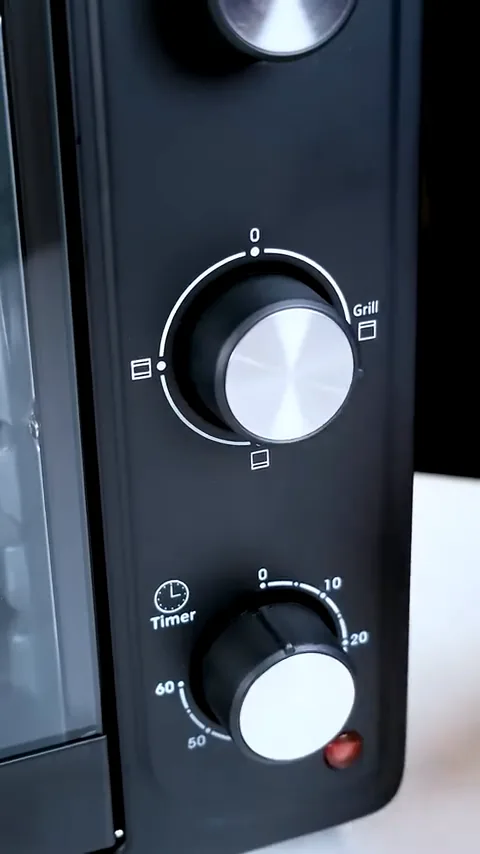 Ajuste do seletor de resistências no painel do forno elétrico