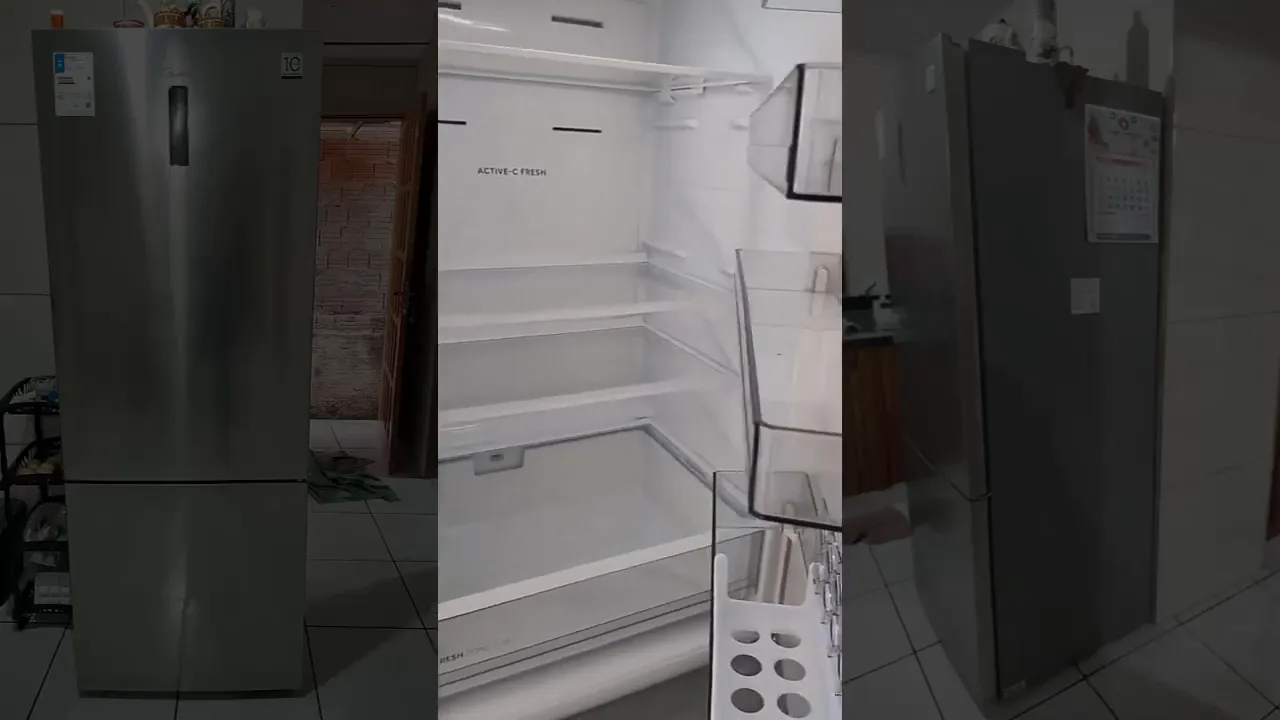 Interior do refrigerador com prateleiras de vidro e gaveta organizadora
