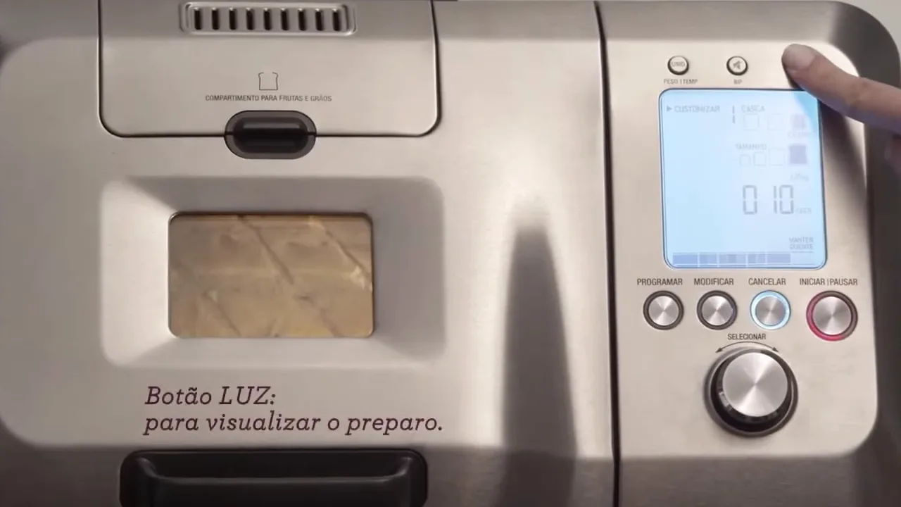 Acionamento da luz interna para verificar a massa no visor