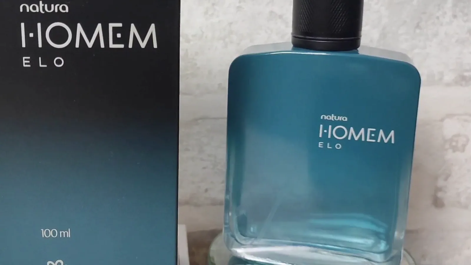 Frasco e caixa do perfume Deo Parfum Natura Homem Elo