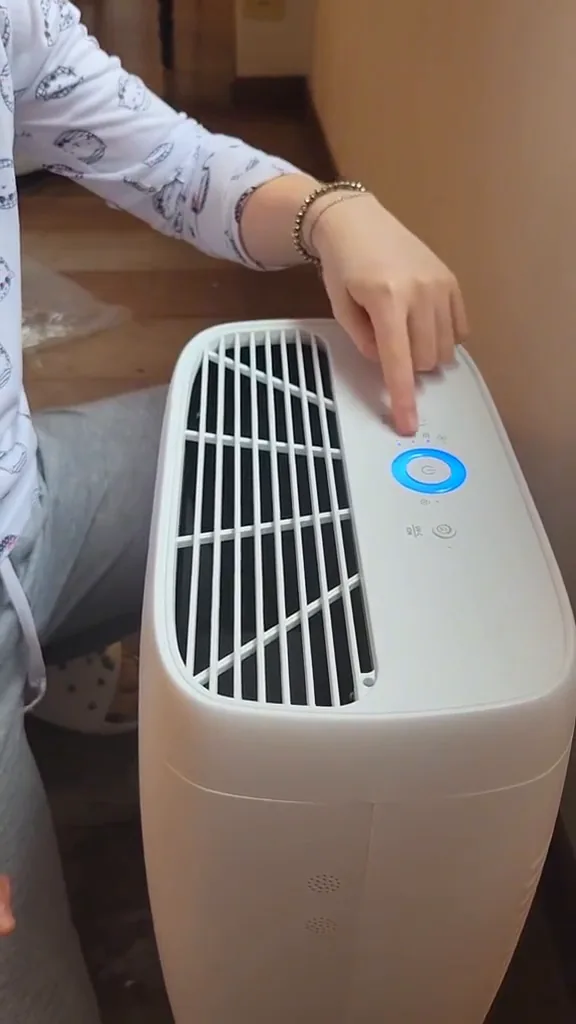 Painel de controle com botão touch e iluminação em funcionamento