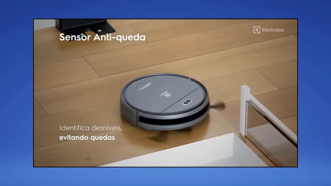 Robô aspirador desviando de desnível próximo à escada com sensores antiqueda