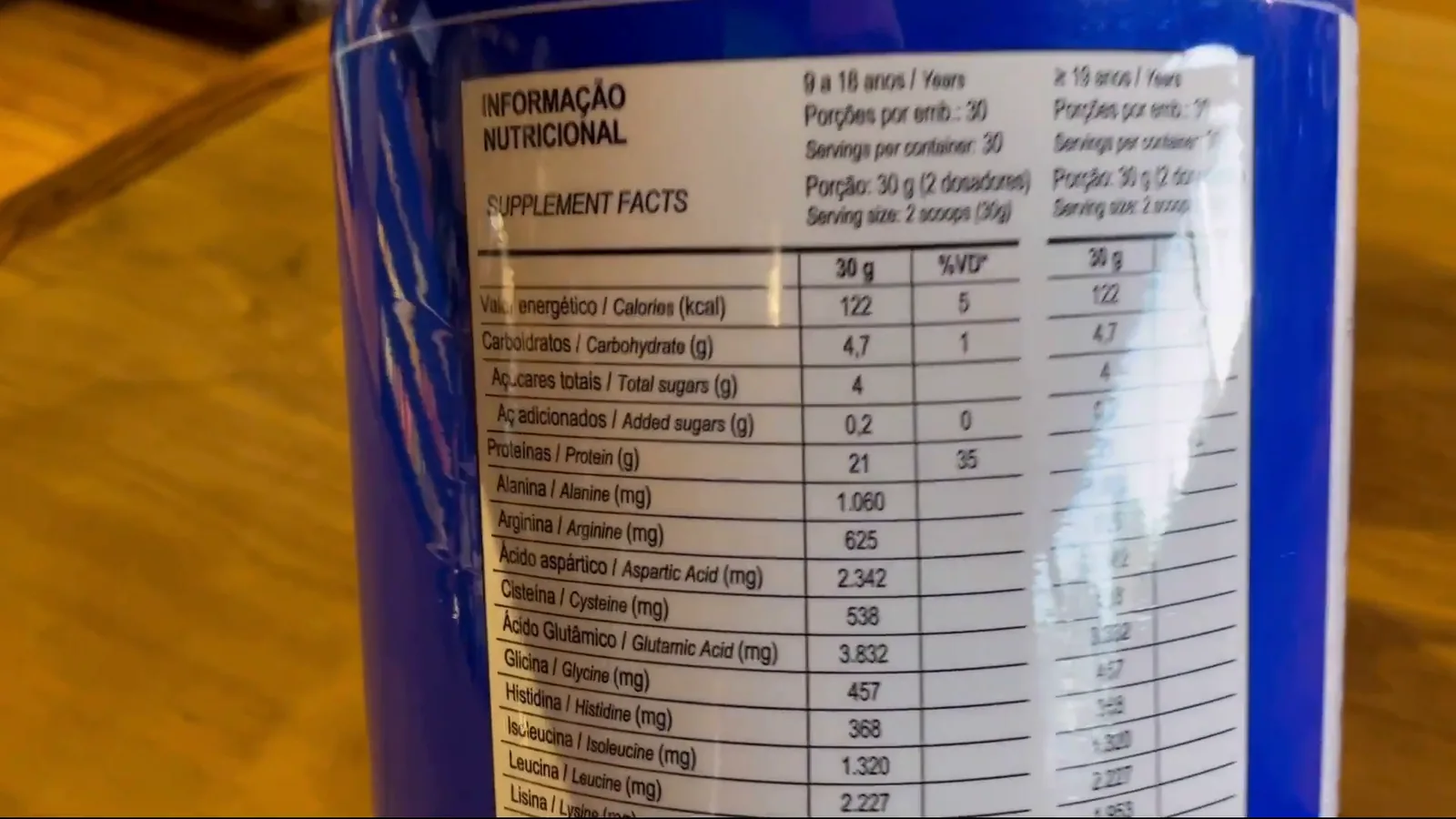 Tabela nutricional destacando 21g de proteína por porção de 30g